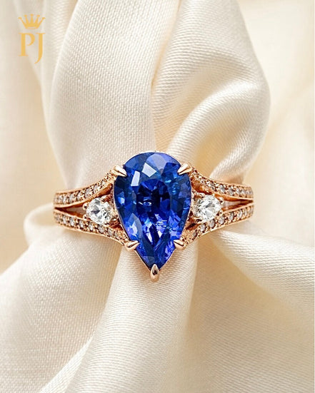 14K rose pear shape blue sapphire and diamond ring