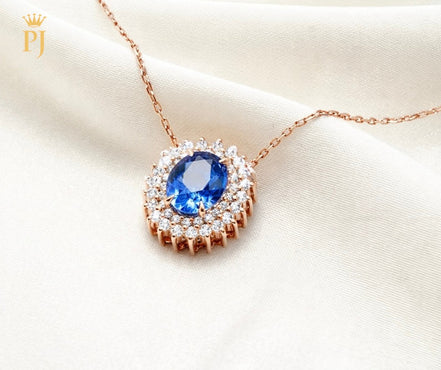 18k rose gold blue sapphire and diamond necklace