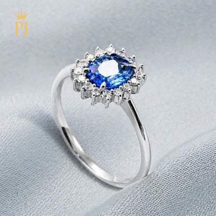 18k white gold blue sapphire and diamond ring
