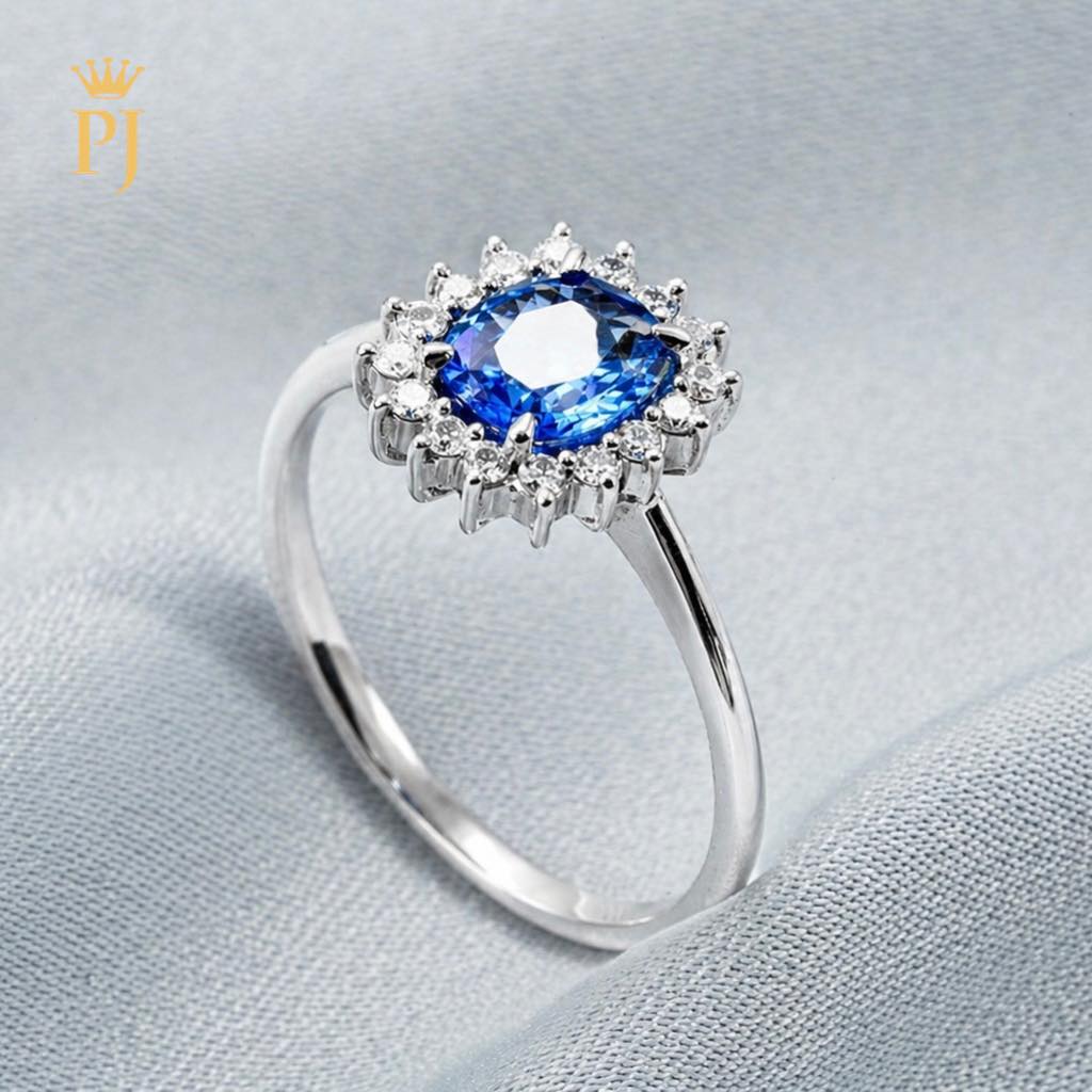 18k white gold blue sapphire and diamond ring