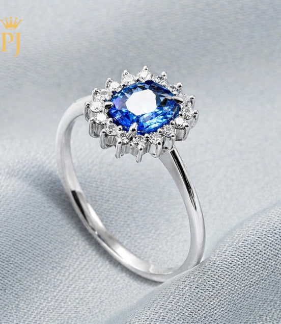 18k white gold blue sapphire and diamond ring