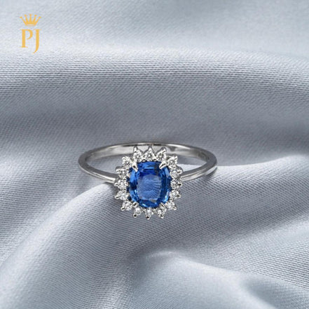 18k white gold blue sapphire and diamond ring