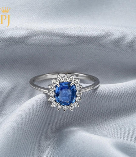 18k white gold blue sapphire and diamond ring