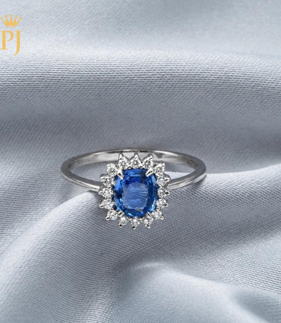 18k white gold blue sapphire and diamond ring