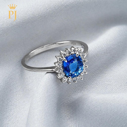 18k white gold blue sapphire and diamond ring