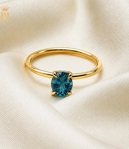 18k yellow gold teal sapphire ring