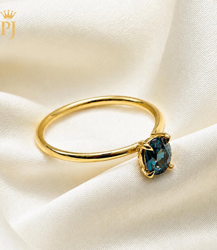 18k yellow gold teal sapphire ring