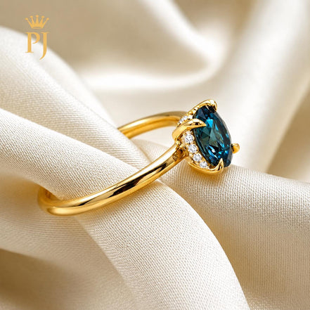18k yellow gold teal sapphire ring