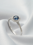 Blue Sapphire &amp; Diamond Halo Ring – 18K White Gold