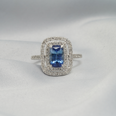 Radiant Elegance – 18K White Gold Blue Sapphire &amp; Diamond Double Halo Ring