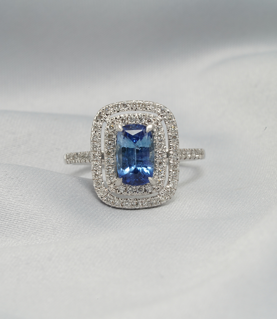 Radiant Elegance – 18K White Gold Blue Sapphire &amp; Diamond Double Halo Ring