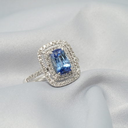 Radiant Elegance – 18K White Gold Blue Sapphire &amp; Diamond Double Halo Ring