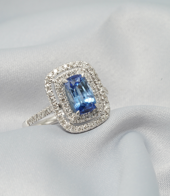 Radiant Elegance – 18K White Gold Blue Sapphire &amp; Diamond Double Halo Ring