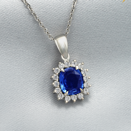 Blue Sapphire Cluster Necklace – A Halo of Brilliance in 18K White Gold