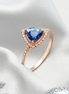 Trillion Blue Sapphire & Diamond Halo Ring – 18K Rose Gold