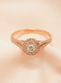 Celestial Glow: 18K Rose Gold Double Halo Diamond Ring