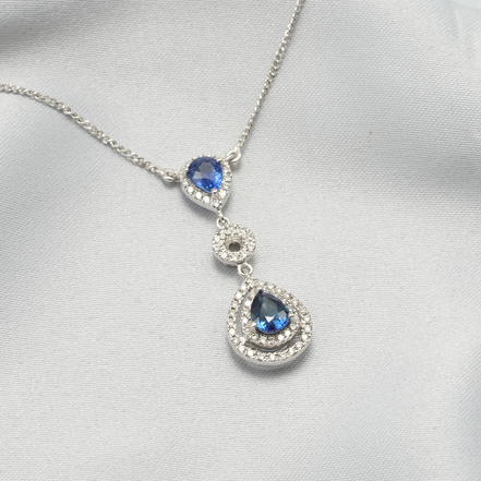 Ocean Tears – 18K White Gold Blue Sapphire & Diamond Necklace