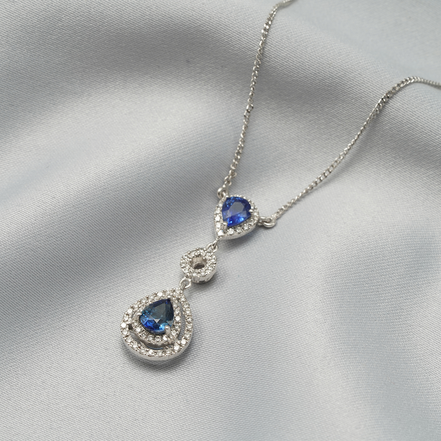 Ocean Tears – 18K White Gold Blue Sapphire & Diamond Necklace