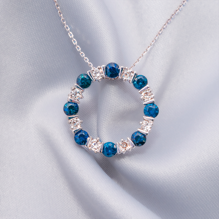 A Spin of Sapphire – 18K White Gold Pendant with Blue Sapphires &amp; Diamonds
