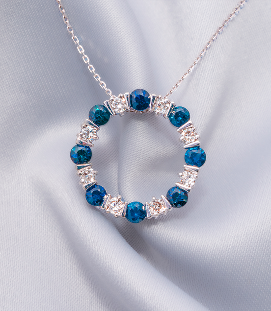 A Spin of Sapphire – 18K White Gold Pendant with Blue Sapphires &amp; Diamonds