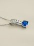 A Blue Jewel in a Crown of Diamonds – 18K White Gold Pendant