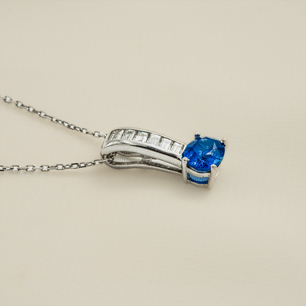 A Blue Jewel in a Crown of Diamonds – 18K White Gold Pendant