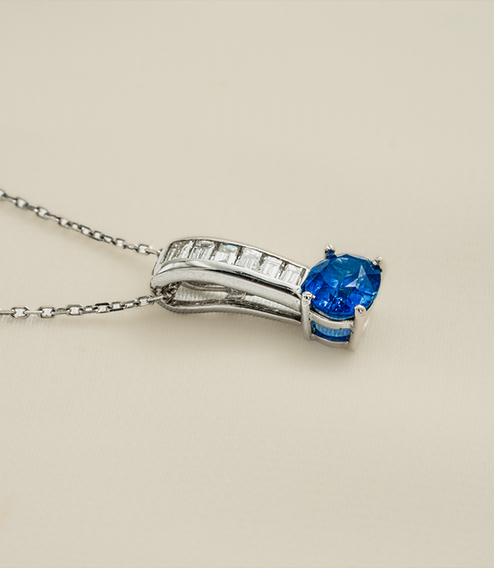 A Blue Jewel in a Crown of Diamonds – 18K White Gold Pendant