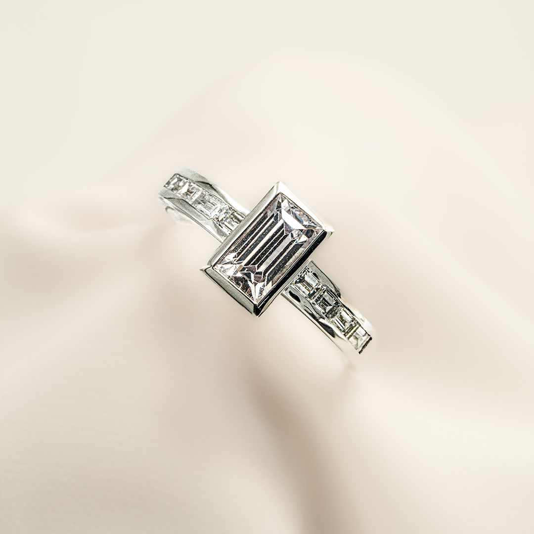 Pure Brilliance – 18K White Gold Ring with White Sapphire & Diamonds