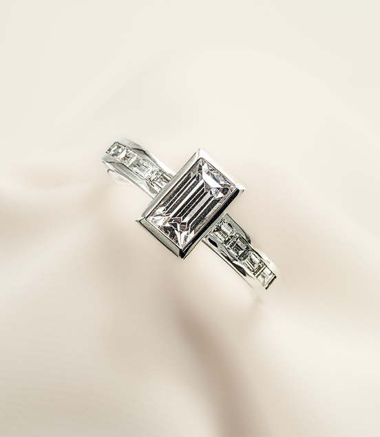 Pure Brilliance – 18K White Gold Ring with White Sapphire & Diamonds